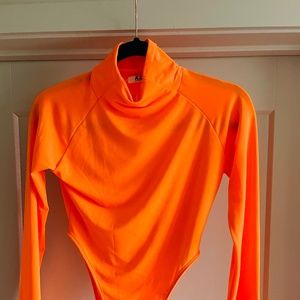 Neon orange body suit